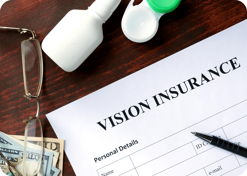 Vision insurance form with glasses and pen.